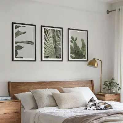 Three-piece wall art set pastel tropical leaves design