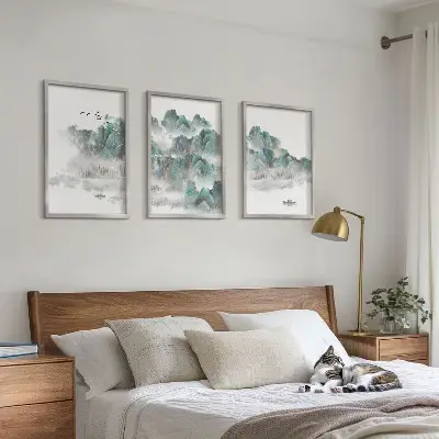Three-piece wall art set featuring mountains, clouds, birds, and a boat in a Japandi style