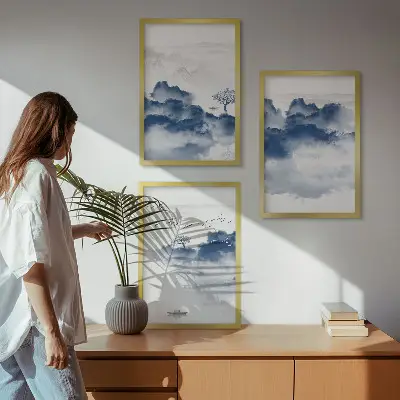 Set of 3 framed wall art pieces featuring mountains, clouds, trees, and birds