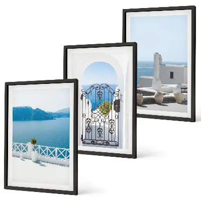 Set of 3 framed wall art pieces featuring white buildings by the sea in Greece