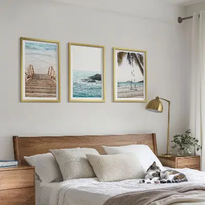 Set of 3 framed wall art pieces featuring a seaside staircase and a beach swing