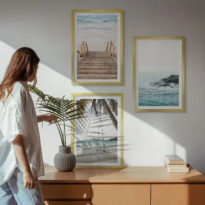 Set of 3 framed wall art pieces featuring a seaside staircase and a beach swing