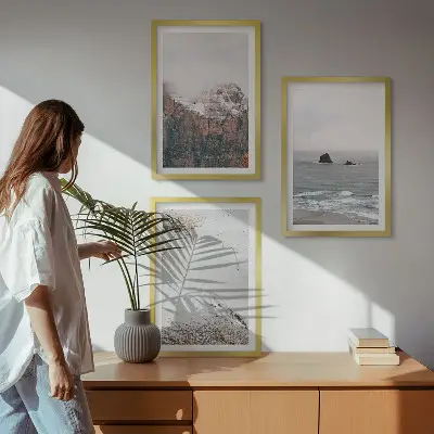 Three-piece wall art set featuring mountains, clouds, sea, and sand nature scenery