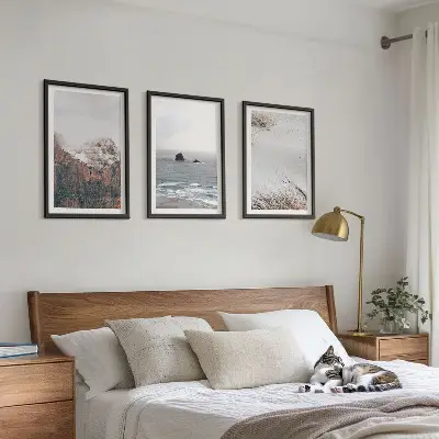 Three-piece wall art set featuring mountains, clouds, sea, and sand nature scenery