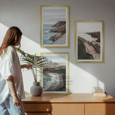 Set of 3 framed wall art pieces featuring cliff views and beach landscapes