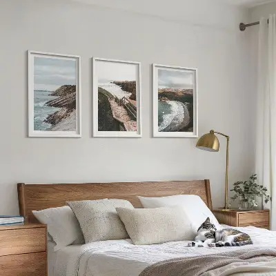 Set of 3 framed wall art pieces featuring cliff views and beach landscapes