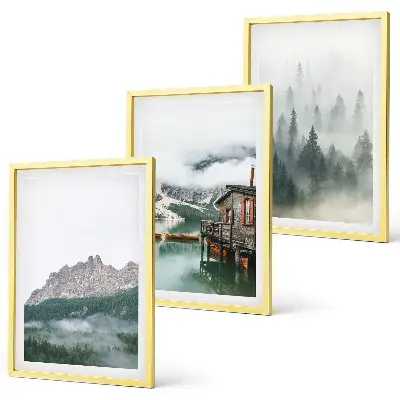 Set of 3 framed wall art pieces featuring mountains, a lake, a cottage, and fog