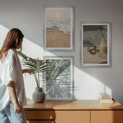 Wall art set featuring water, beach, a hat, and sunglasses