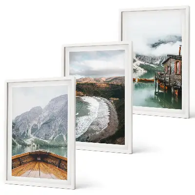 Three-piece wall art set featuring a landscape of a mountain lake with a boat and beach