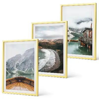 Three-piece wall art set featuring a landscape of a mountain lake with a boat and beach