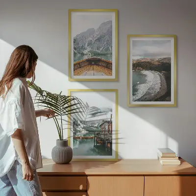 Three-piece wall art set featuring a landscape of a mountain lake with a boat and beach