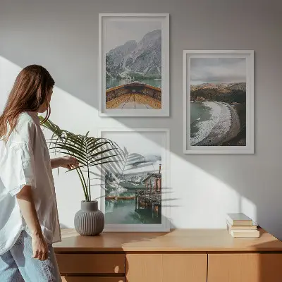 Three-piece wall art set featuring a landscape of a mountain lake with a boat and beach