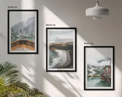 Three-piece wall art set featuring a landscape of a mountain lake with a boat and beach