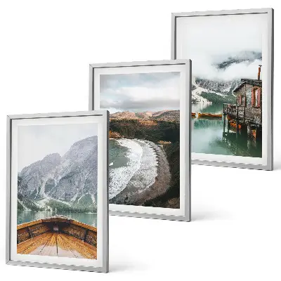 Three-piece wall art set featuring a landscape of a mountain lake with a boat and beach