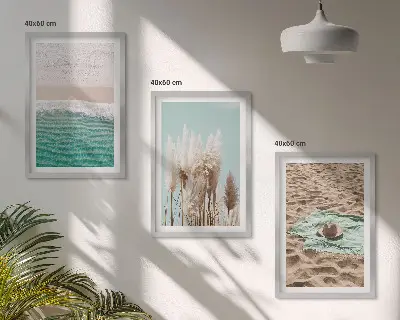Set of 3 framed wall art pieces featuring a beach with waves, grass, and a hat
