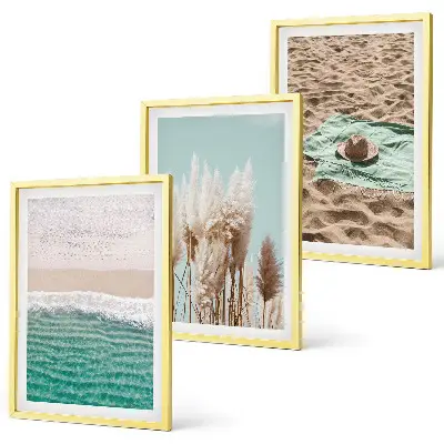 Set of 3 framed wall art pieces featuring a beach with waves, grass, and a hat