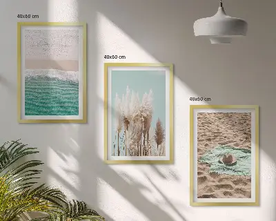 Set of 3 framed wall art pieces featuring a beach with waves, grass, and a hat