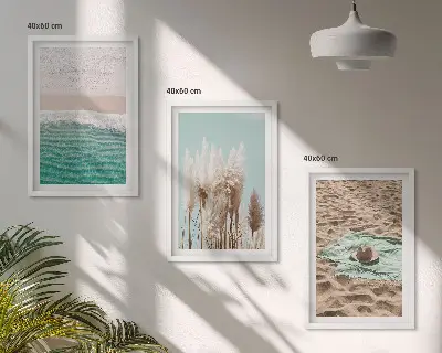 Set of 3 framed wall art pieces featuring a beach with waves, grass, and a hat