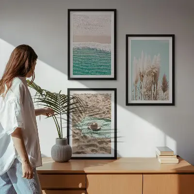 Set of 3 framed wall art pieces featuring a beach with waves, grass, and a hat