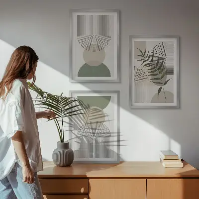 Three-piece wall art set with abstract shapes and greenery