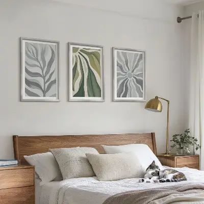 Set of 3 framed wall art pieces featuring green plant patterns