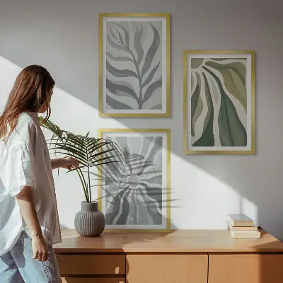 Set of 3 framed wall art pieces featuring green plant patterns