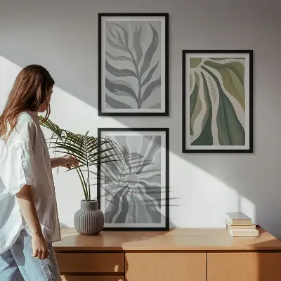 Set of 3 framed wall art pieces featuring green plant patterns