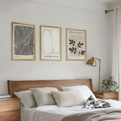 Set of 3 framed wall art pieces with plant patterns and line art designs