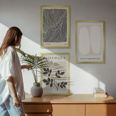 Set of 3 framed wall art pieces with plant patterns and line art designs
