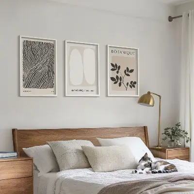 Set of 3 framed wall art pieces with plant patterns and line art designs