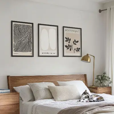 Set of 3 framed wall art pieces with plant patterns and line art designs
