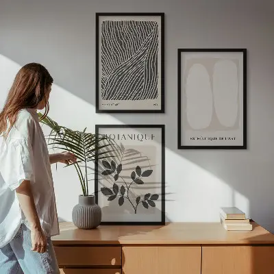 Set of 3 framed wall art pieces with plant patterns and line art designs