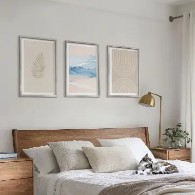 Three-piece wall art set featuring beige and blue waves and leaves