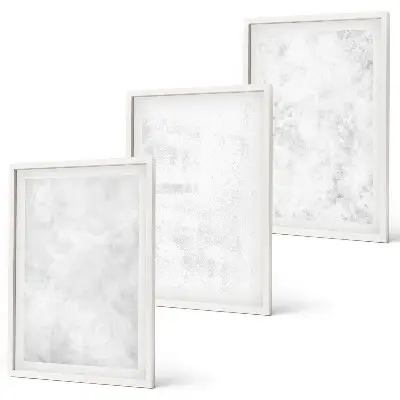 Set of 3 framed wall art pieces with white spots on a minimalist background
