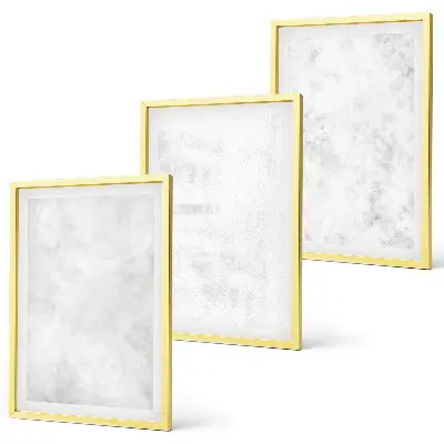 Set of 3 framed wall art pieces with white spots on a minimalist background