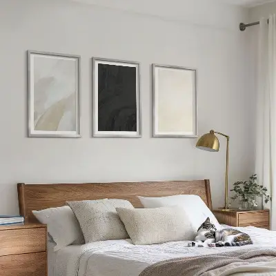 Set of 3 framed wall art pieces featuring structures in minimalist shades