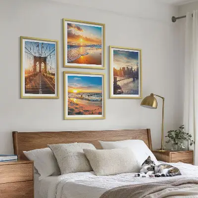 Multi-piece wall decor set featuring a bridge during a city sunset