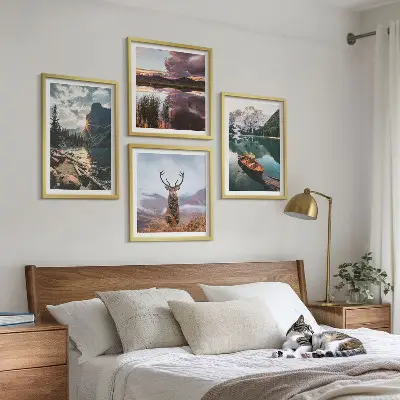 Wall art set featuring a mountain lake with a boat at sunset and a deer