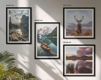 Wall art set featuring a mountain lake with a boat at sunset and a deer