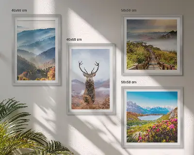 Set of 4 wall art pieces featuring a mountain landscape with a lake and deer