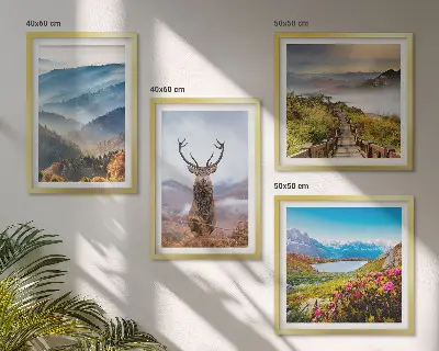 Set of 4 wall art pieces featuring a mountain landscape with a lake and deer