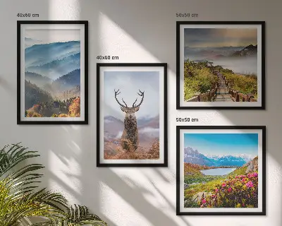 Set of 4 wall art pieces featuring a mountain landscape with a lake and deer