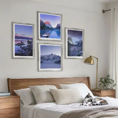 Multi-piece mountain landscape wall art set featuring a sunset over water