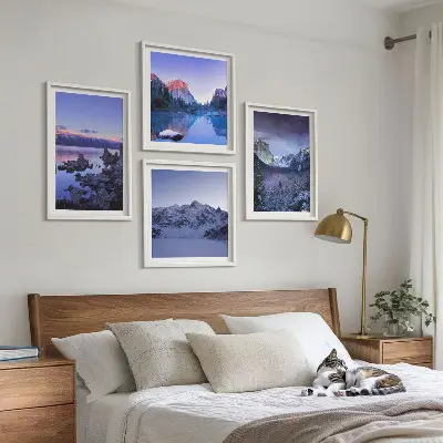 Multi-piece mountain landscape wall art set featuring a sunset over water