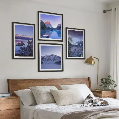 Multi-piece mountain landscape wall art set featuring a sunset over water