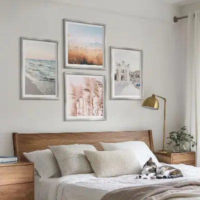 Wall art set featuring plants, sea waves, a scenic view, and houses