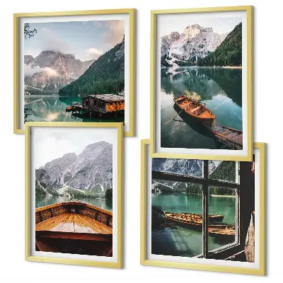 Set of 4 wall art pieces featuring a lake with mountains, boats, and a cottage window view