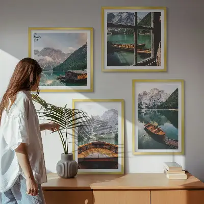 Set of 4 wall art pieces featuring a lake with mountains, boats, and a cottage window view