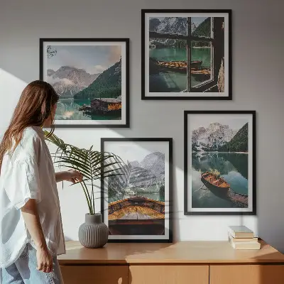 Set of 4 wall art pieces featuring a lake with mountains, boats, and a cottage window view