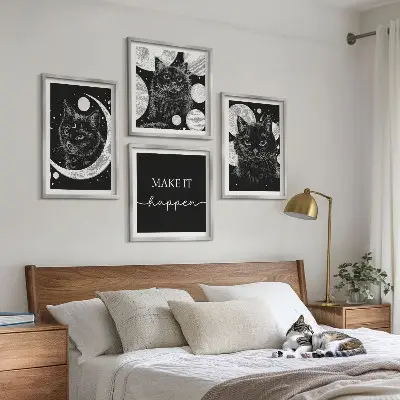 Wall art set featuring black cats, moon, and planet